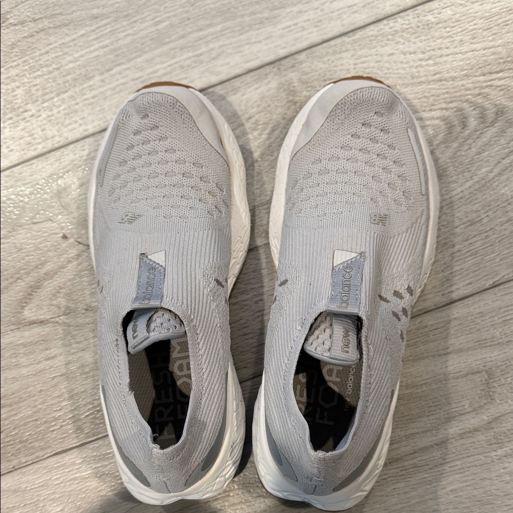 New Balance Light Gray Slip-On Sneakers with Brown Sole